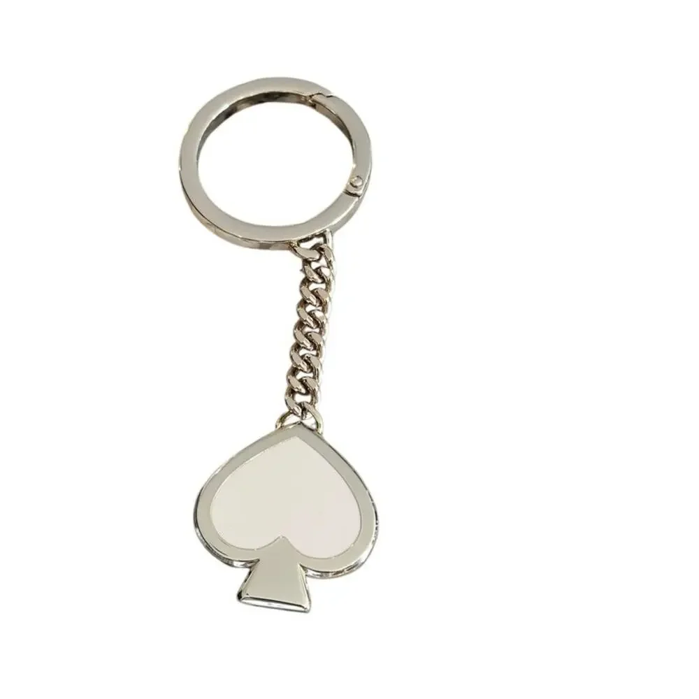 Kate Spade Spade shape Keyfob bag charm white/ black Gold tone